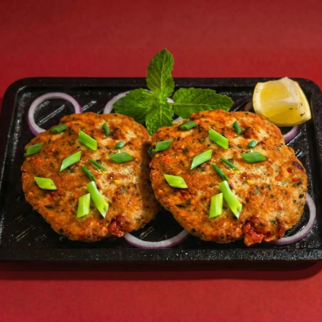 2 Chicken Chapli Kabab with 2 sodas.